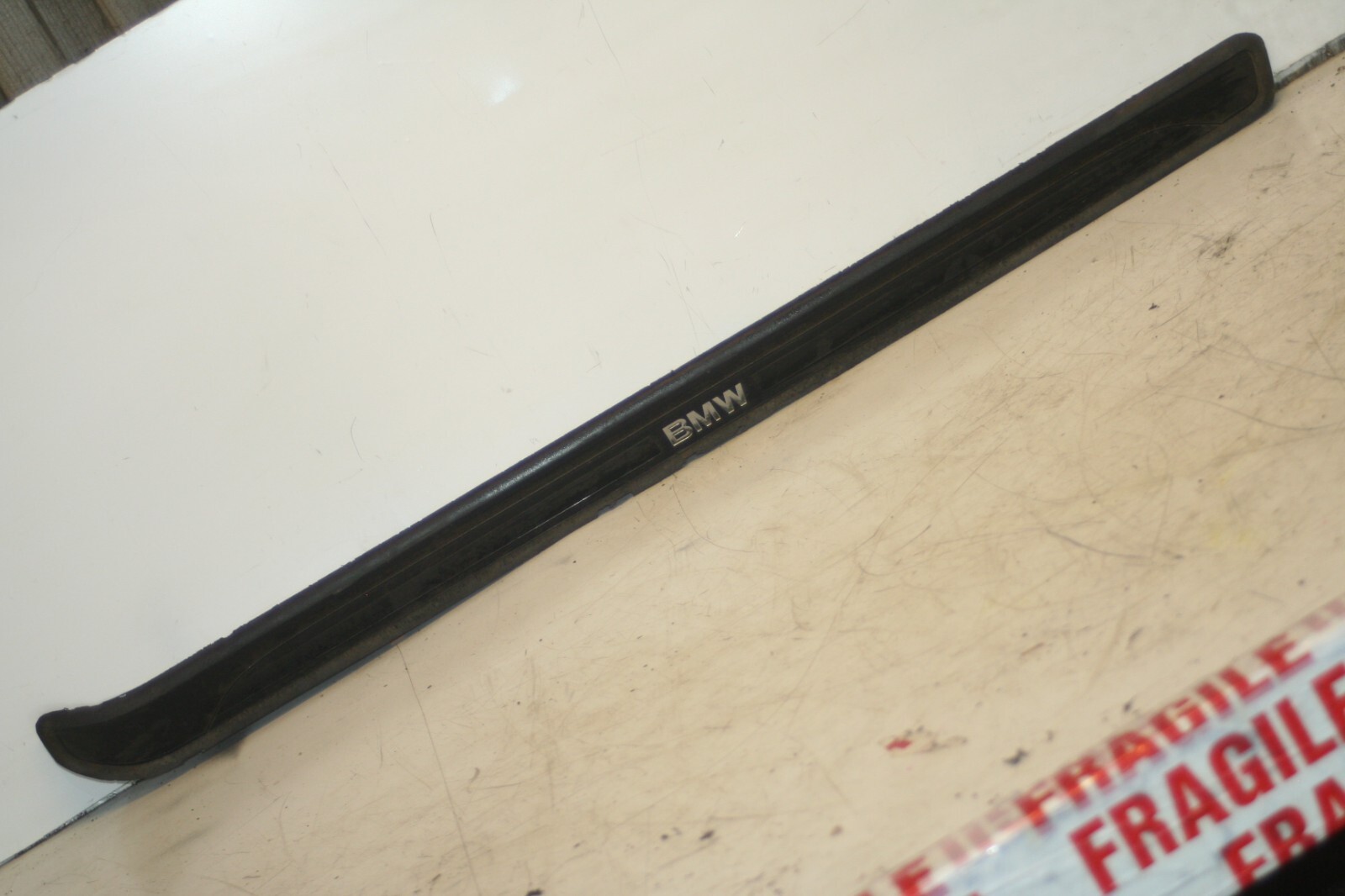 (95) 2010 BMW 1 SERIES E82. LOWER SILL TRIM BMW KICK TRIM 608290